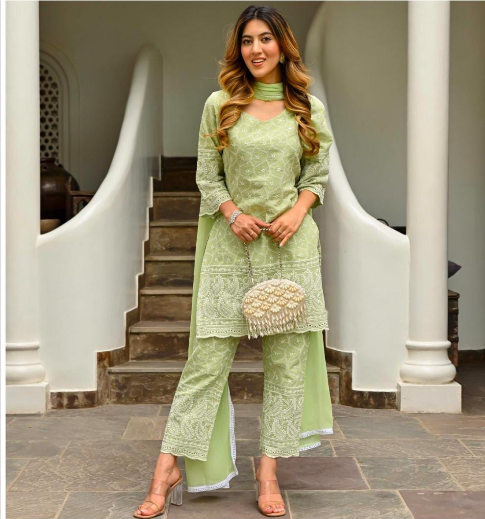Celebrate  the candid  femininity with green colour chikenkari embroidered  Kurta set with dupptta A perfect  companion  for all occasions,  this tenderly  Keira set vows to fetch you countless  compliments no matter where you go