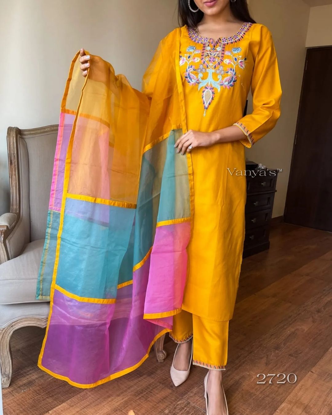 Embrace your festival look with this royal suit set made in an elegant shade of yellow paired with a sleek elegant tyre shade of organza duppta ..